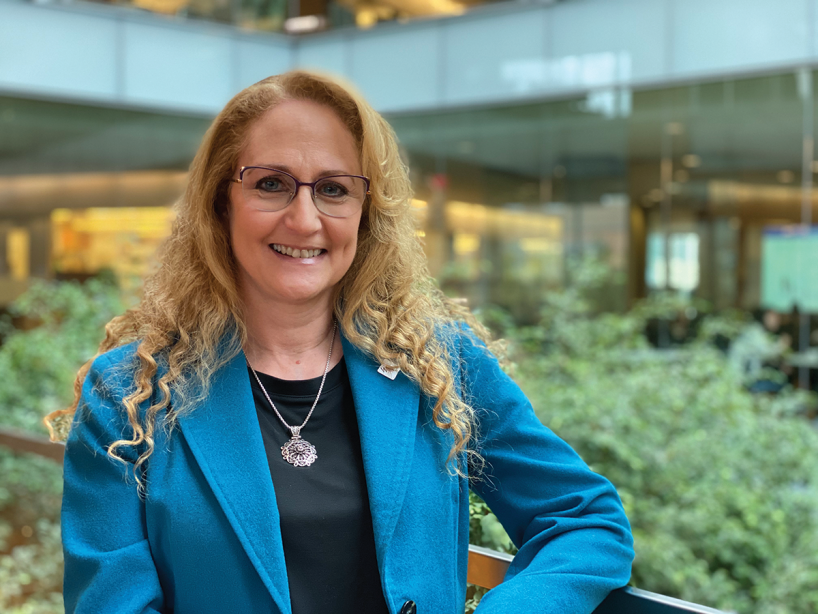 Headshot of Dr. Jo Handelsman in front of plants